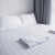 Poszewka na poduszkę 50x70 Hotelowa Adamaszek Pasek 4mm biała